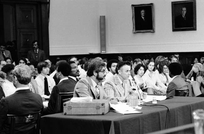 James Earl Ray sits with his attorney Mark Lane during testimony before the House Assassinations Committee in Washington, 1978.