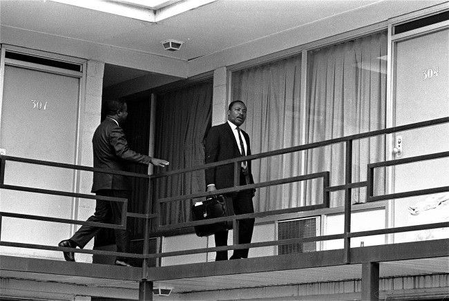 Rev. Martin Luther King walks across the balcony of the Lorraine Motel in Memphis, Tennessee, 1968.