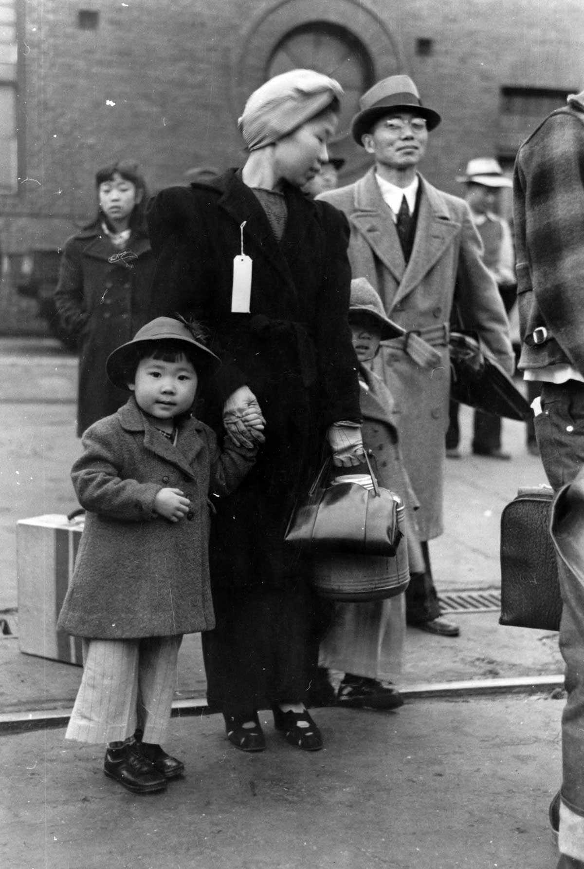 Japanese-American child who will go with his parents to Owens Valley, 1942.