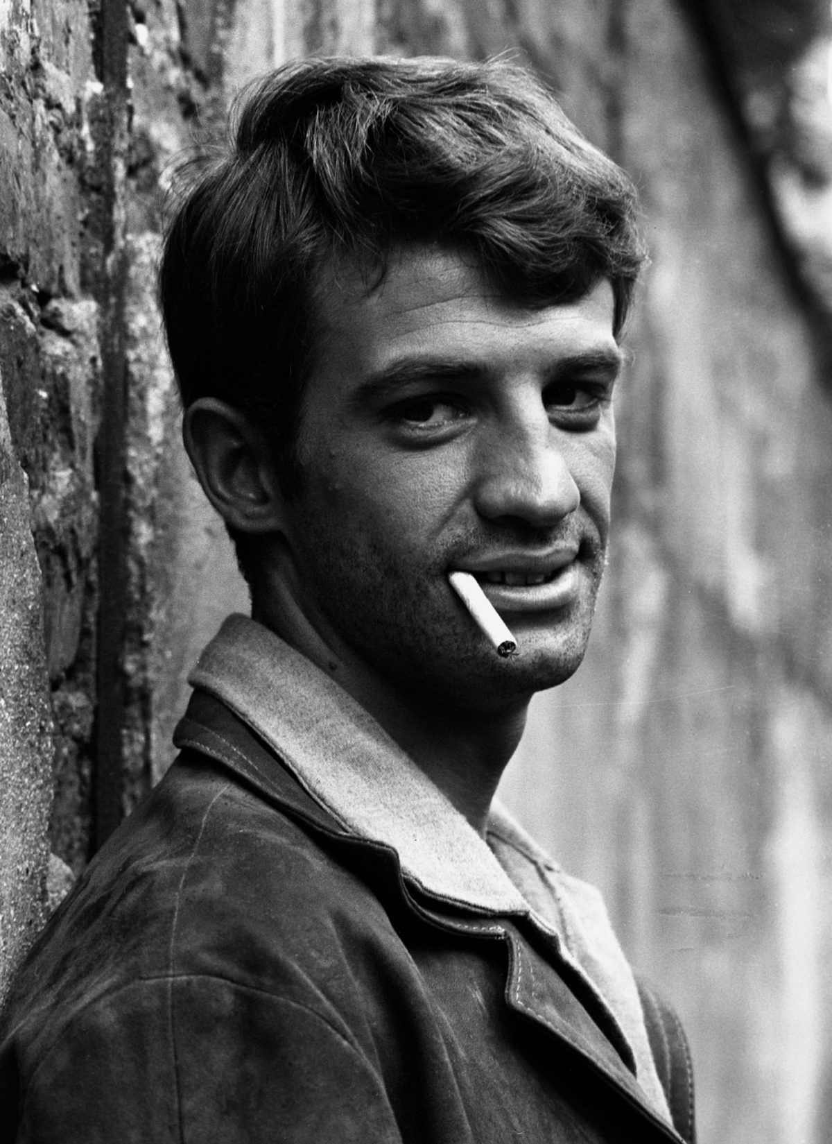 Raymond Cauchetier and Jean-Paul Belmondo on the set of 'A bout de Souffle' directed by Jean-Luc Godard, 1960.