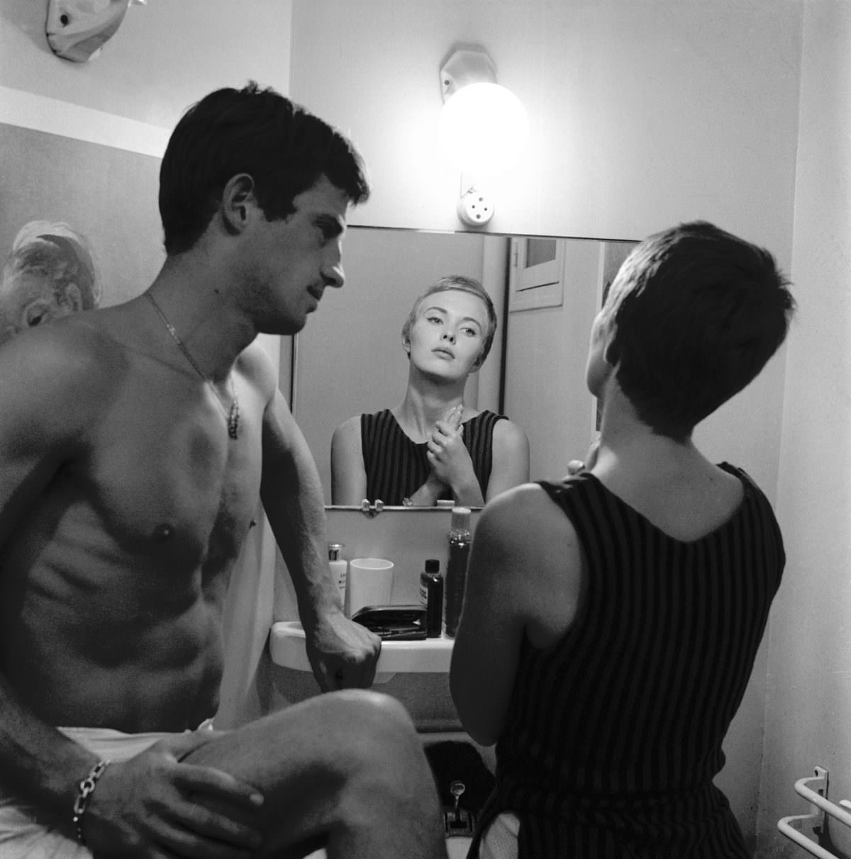 Raymond Cauchetier and Jean-Paul Belmondo on the set of 'A bout de Souffle' directed by Jean-Luc Godard, 1960.