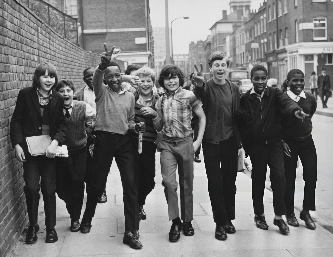 Rutherford Comprehensive School pupils wearing their ordinary clothes arrive at the school in Marylebone, London, 1972.