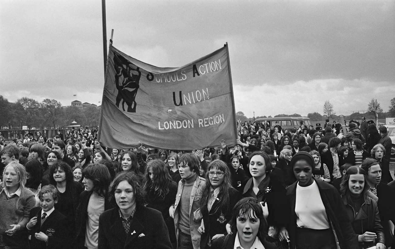 School children march to County Hall as part of a demonstration for the School Action Union against school dinners, caning, and school uniforms, London, 1972.