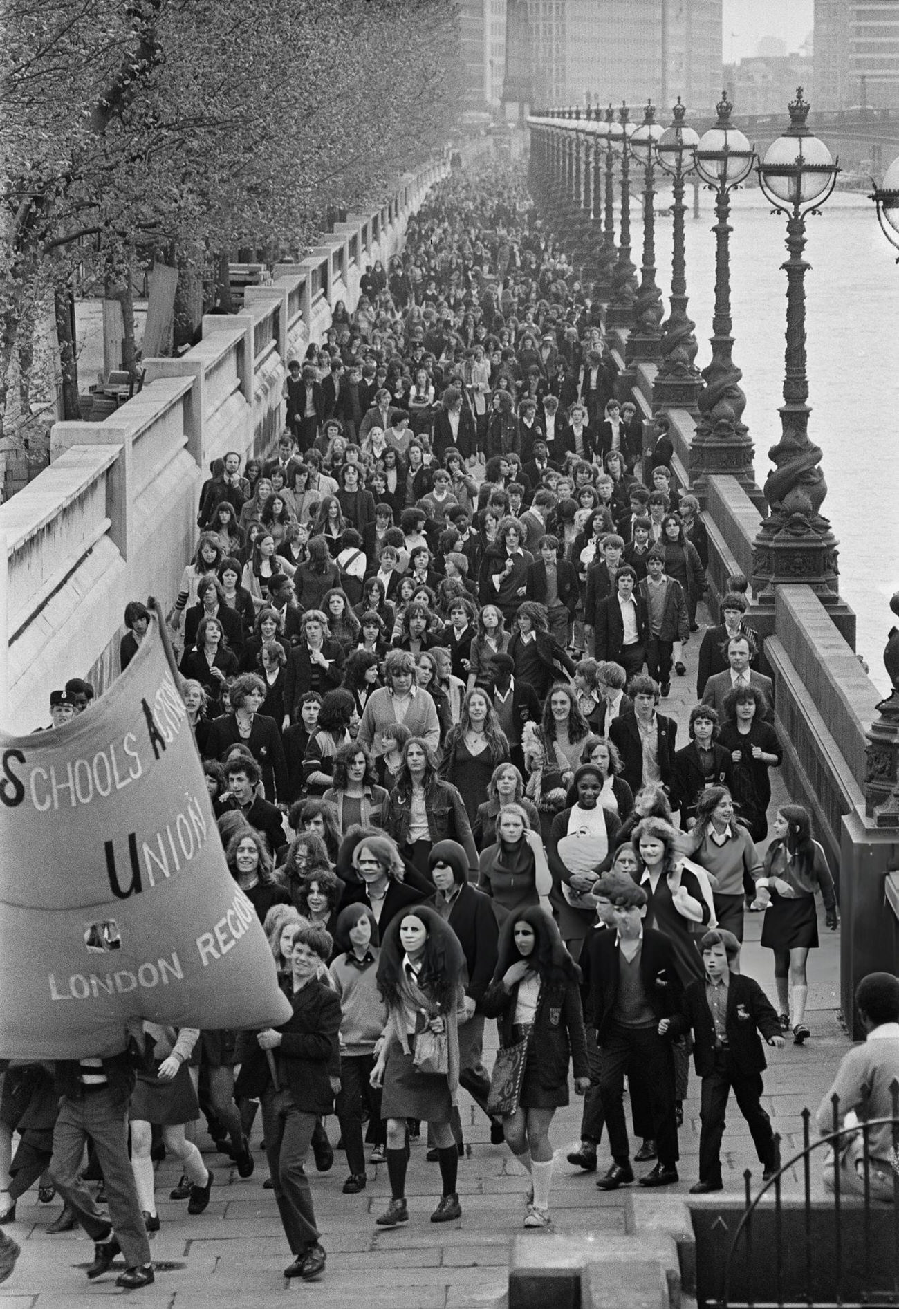 School children march to County Hall as part of a demonstration for the School Action Union against school dinners, caning, and school uniforms, London, 1972.