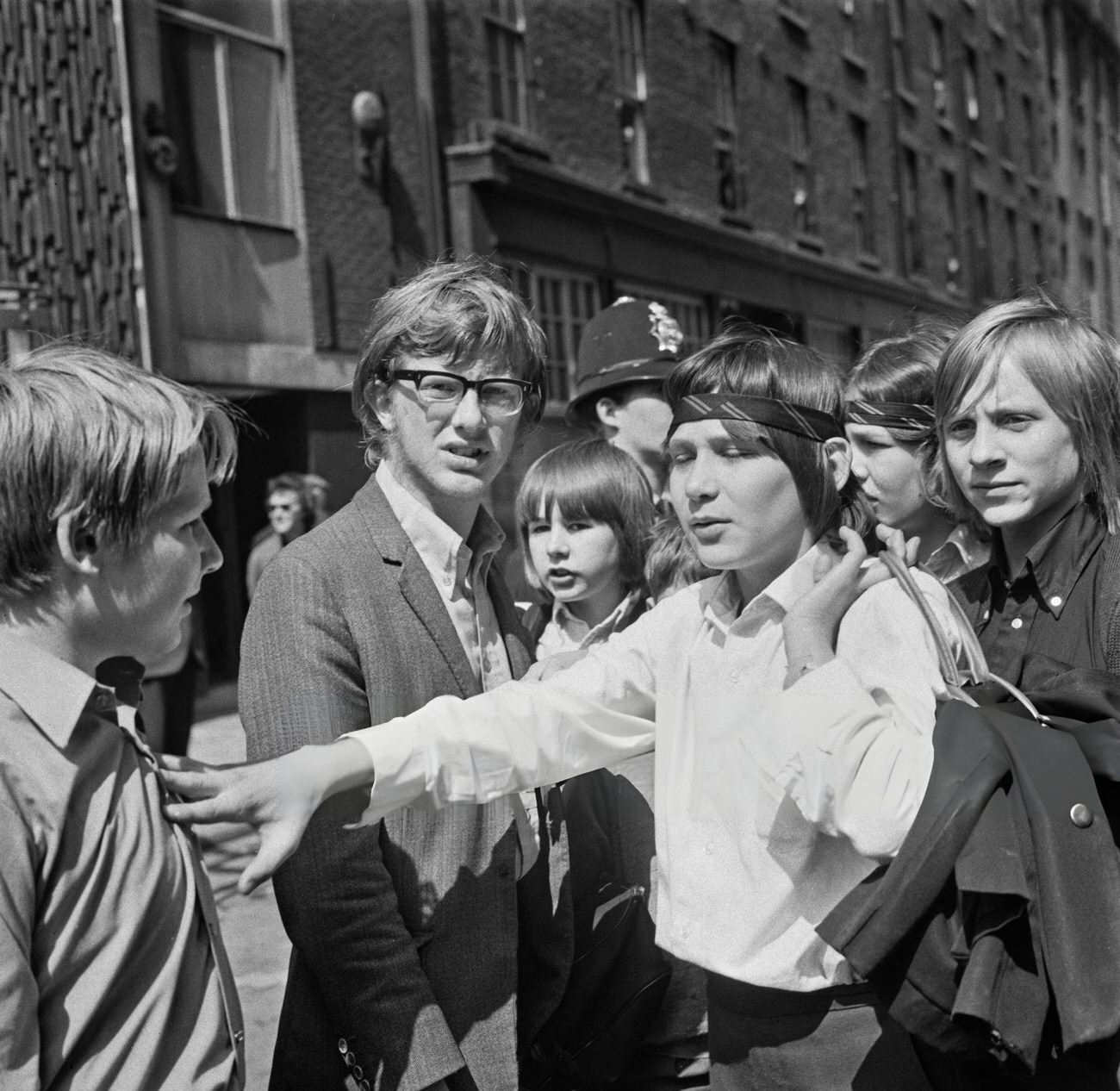 Spokesperson Stephen Finch leads pupils of Rutherford Comprehensive School in Marylebone, London, on a strike organized by the Schools Action Union, 1972.