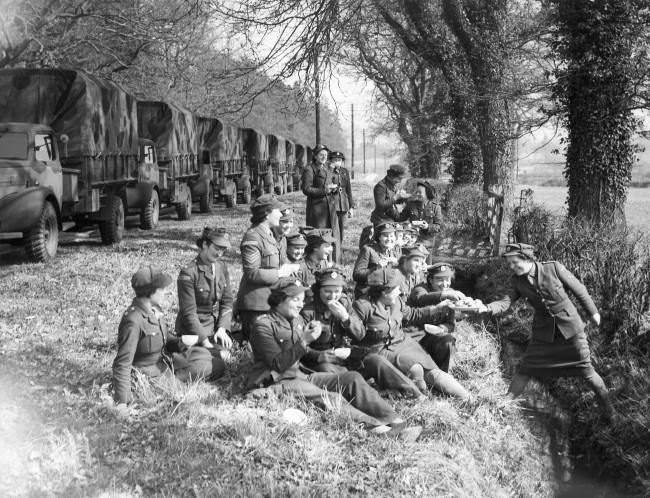 A convoy of new lorries was driven entirely by A.T.S. personnel from a Bedfordshire factory to a Gloucestershire R.A.S.C. depot.