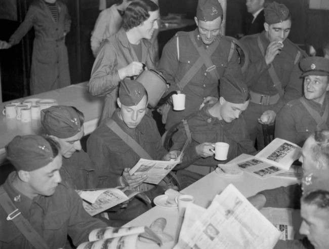 A parcels office at a big London railway station has been opened as a canteen for soldiers passing through, in pursuance of a scheme to make the waiting time troops must spend at stations in these days more comfortable.