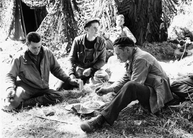 For four long years, the French Underground bravely resisted the Nazi Oppressors of France. Gleaning vital information about German Fortifications the Patriots try to establish contact with Allied Forces moving thru Normandy. After turning all their information over to the Allies, the Frenchmen sit down to a meal with their American Friends in France, 1944.