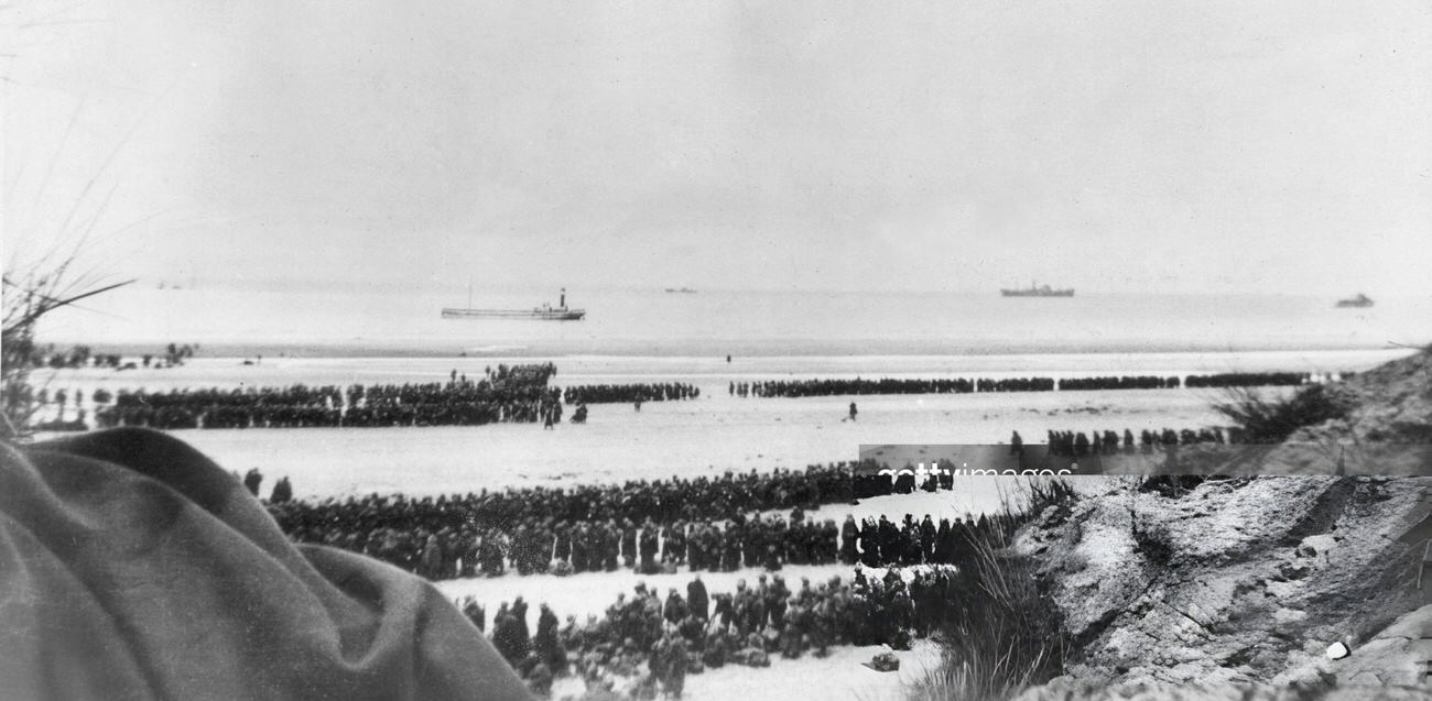 British Expeditionary Forces and French troops awaiting evacuation from the beach at Dunkirk, 1940.