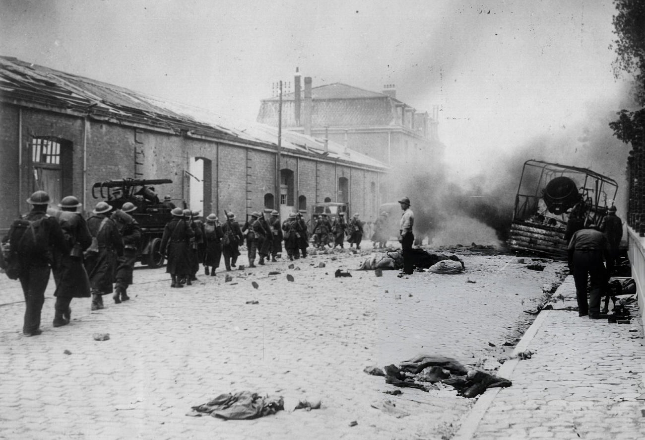 A street in Dunkirk under heavy bombardment during the German attempt to take the town before the evacuation of the allied armies, 1940.