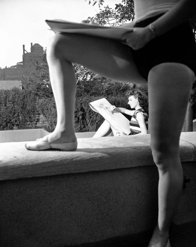 Corliss Fyfe sketches a picture on the Radio City Music Hall roof playground, 1951.