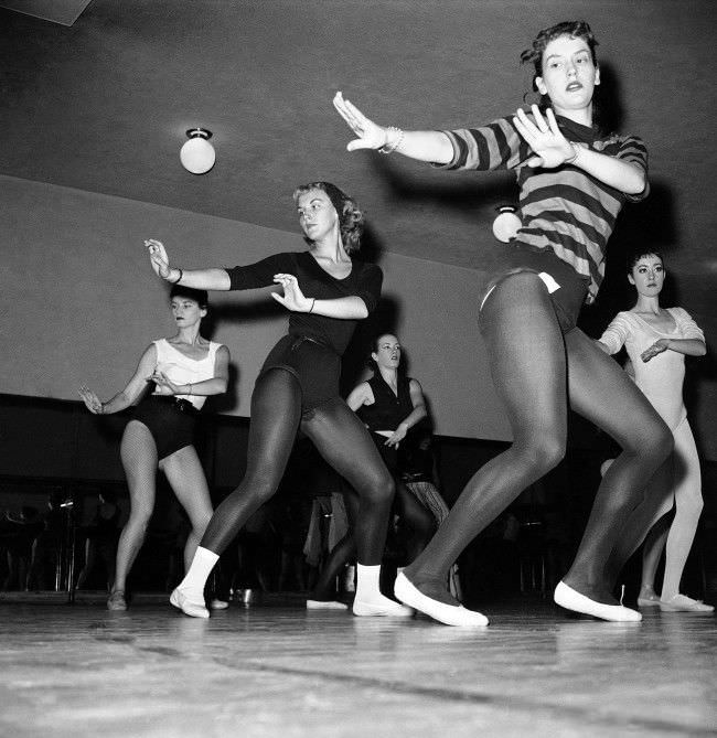 Thirty-six girls, dancing as one on the huge stage of Radio City Music Hall, 1958.