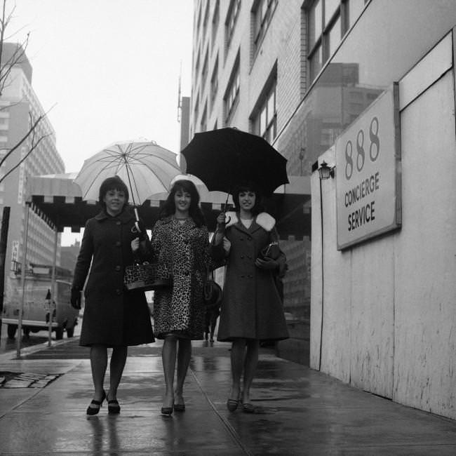 Three Rockettes walk to work for an early morning rehearsal, 1966.