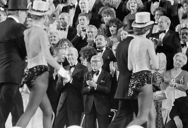 The stars applaud as Radio City Musical Hall Rockettes leave the stage after the “Night of the 100 stars” at Radio City in New York, 1982.