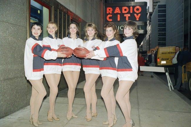 Six members of Radio City Music Hall Rockettes pose in New York, 1980s.