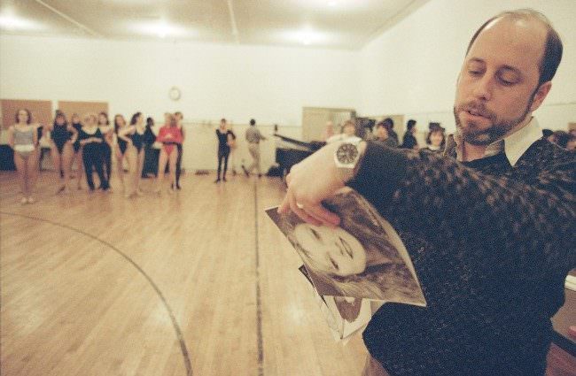 Radio City Music Hall stage manager Howard Kolis reads off the names of Rockette hopefuls, 1993.