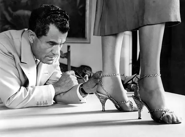 Salvatore Ferragamo with his gold sandal, 1956.