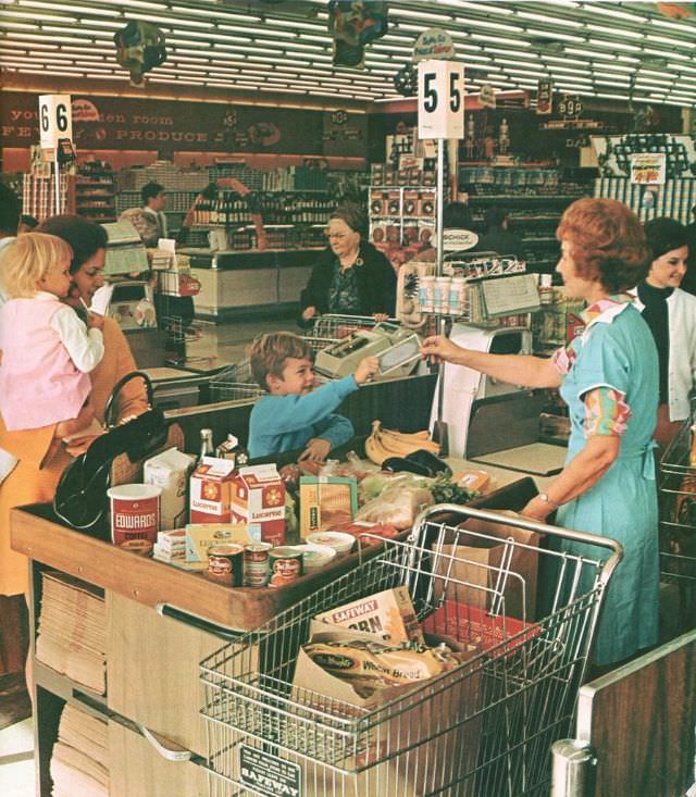 Paying for groceries, circa mid-1960s.