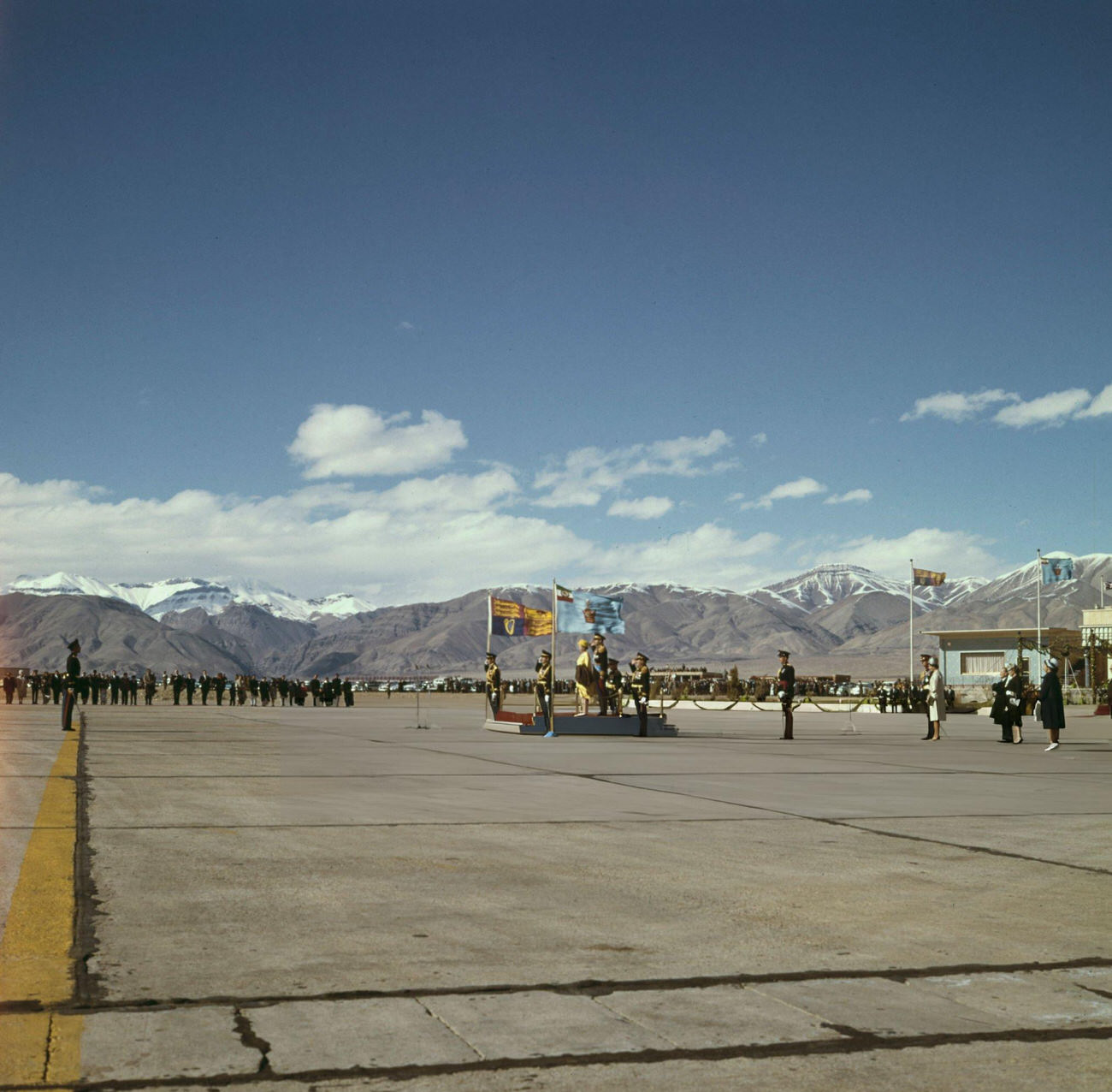 Queen Elizabeth II is welcomed at Tehran's Mehrabad Airport, 1961.