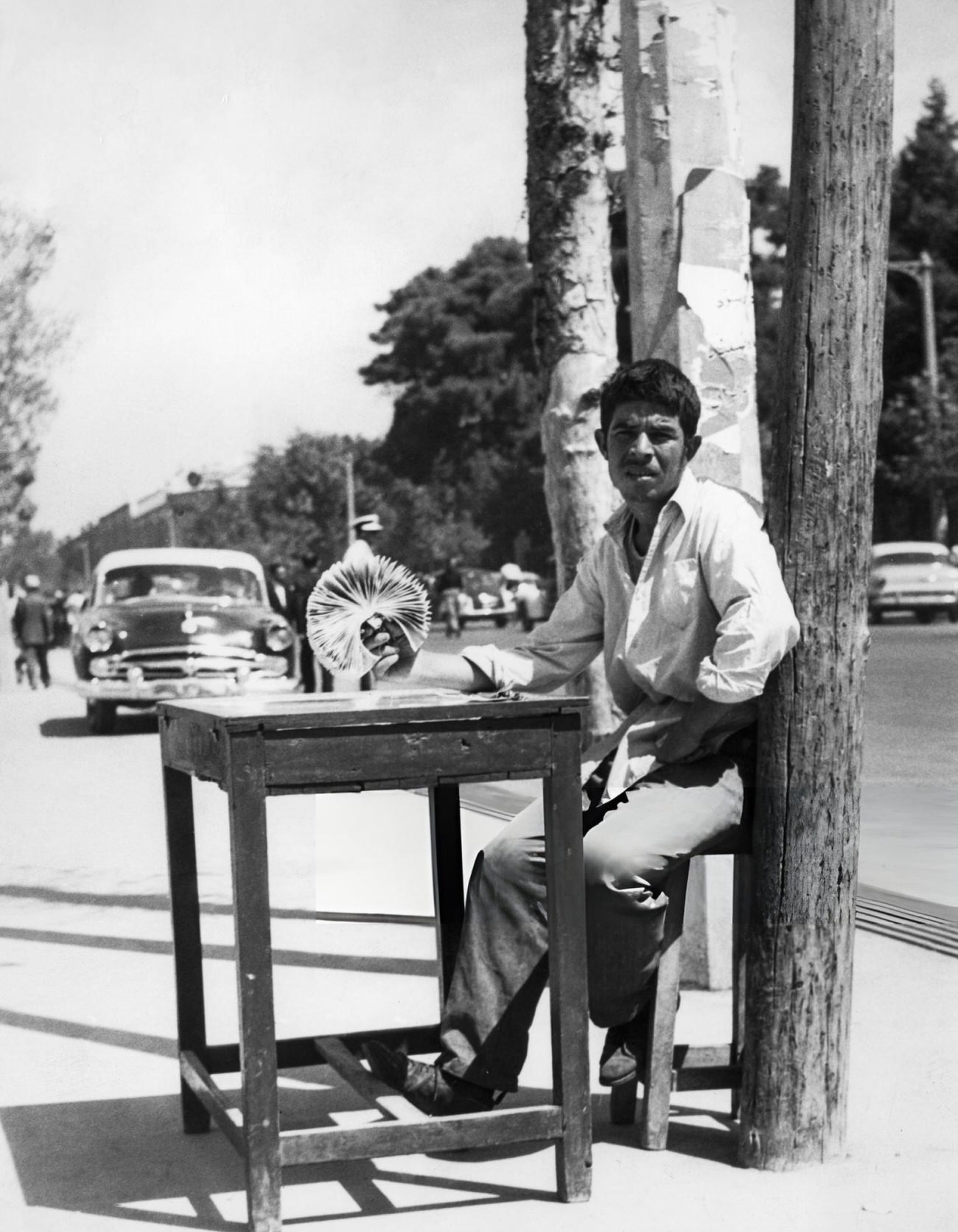 Lottery ticket seller in Tehran, 1960s.