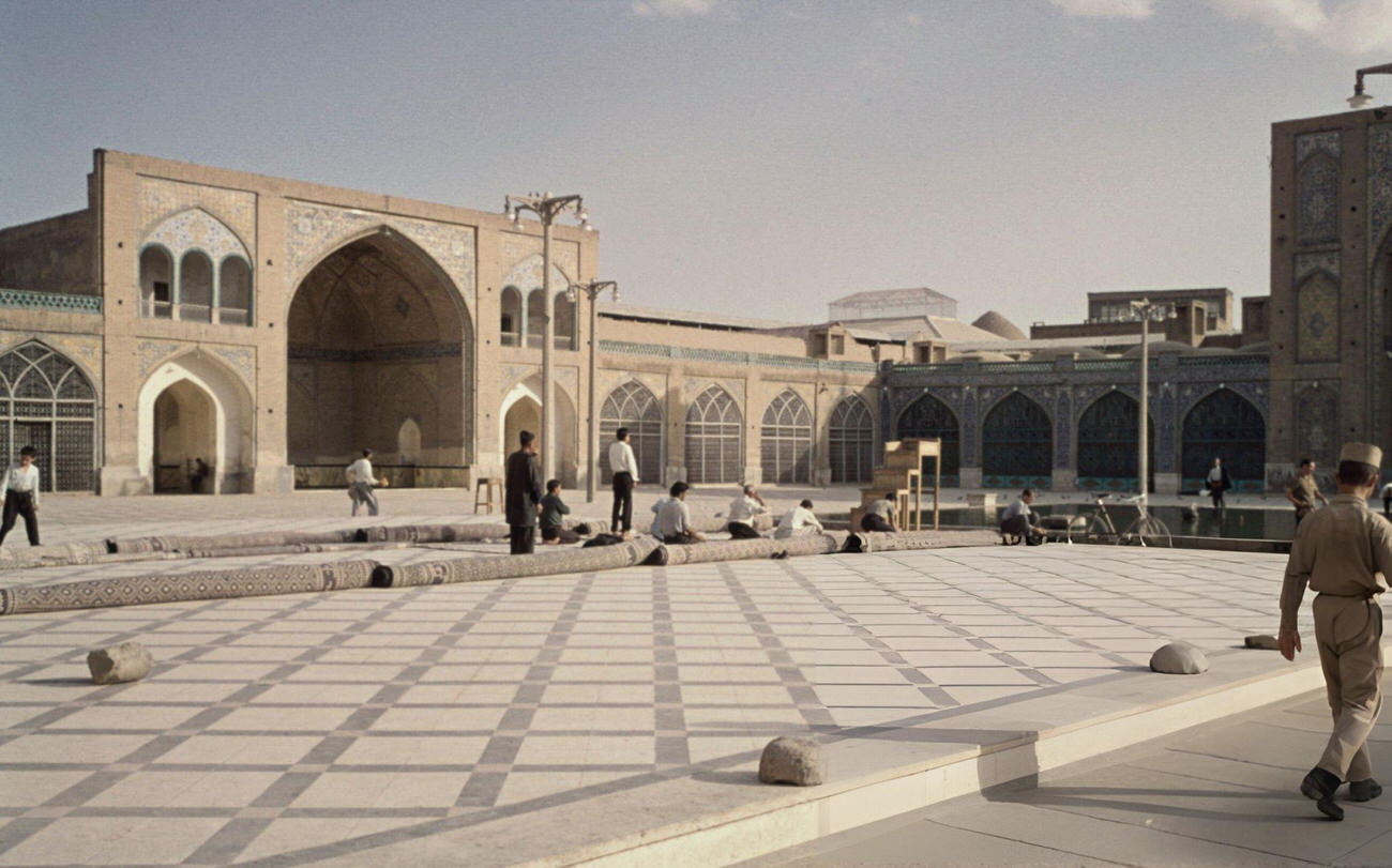 Muslim men prepare to pray in the courtyard of the Shah Mosque in Tehran, 1967.