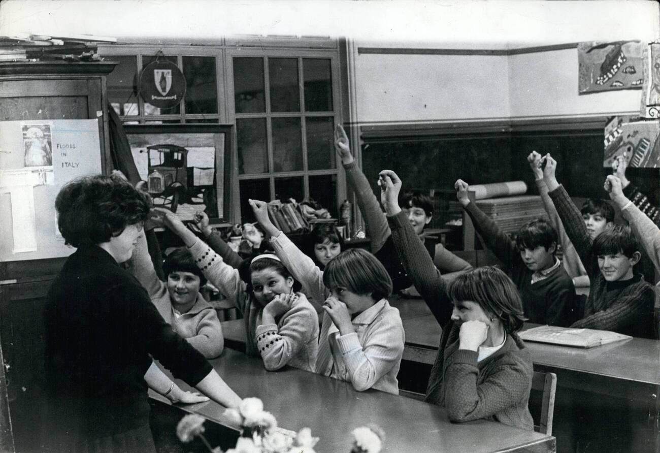 Nearly 200 Aberfan children returned to school and stood in silent tribute to their 116 friends who died in the tip disaster, 1966.