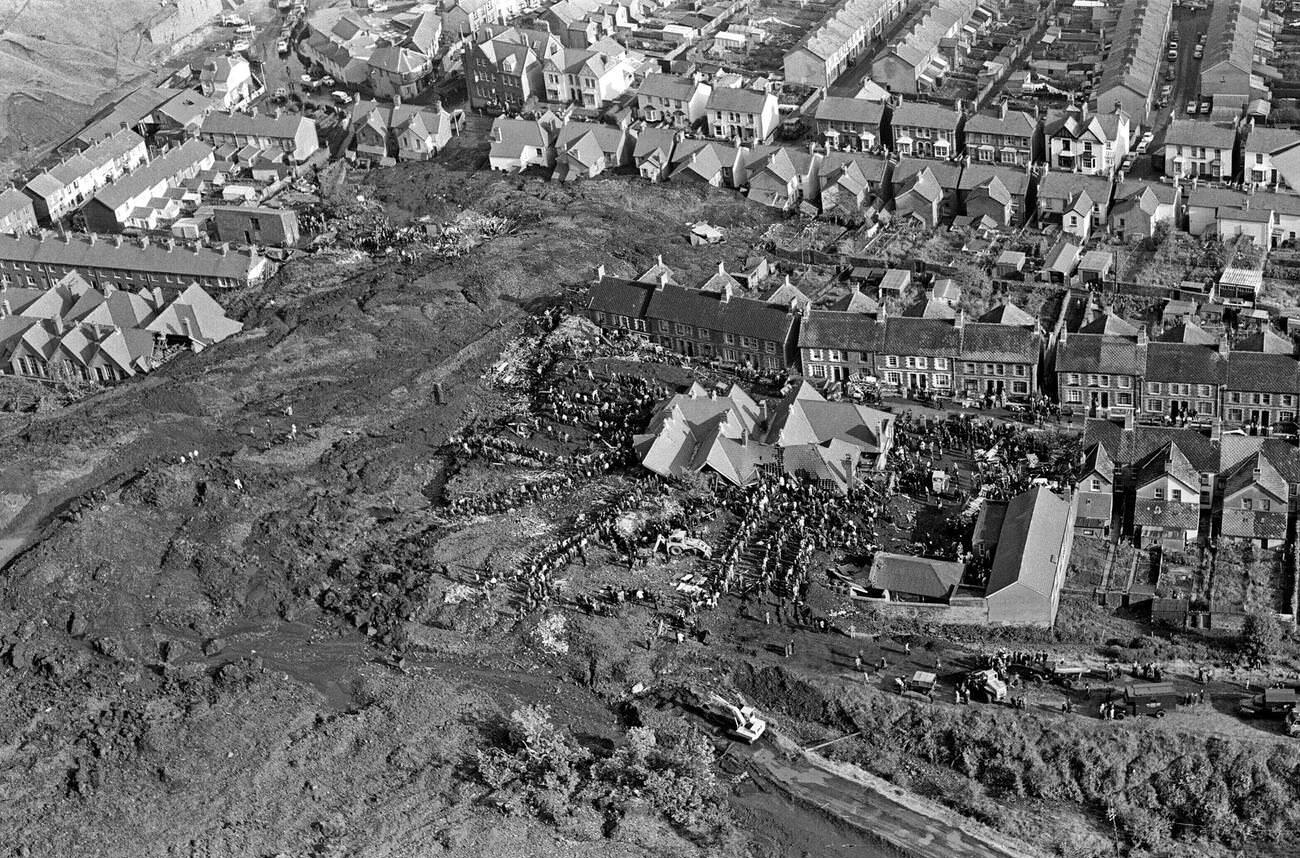 An aerial picture shows the town of Aberfan below, the mud slide, and how the mud destroyed the school and houses, 1966.