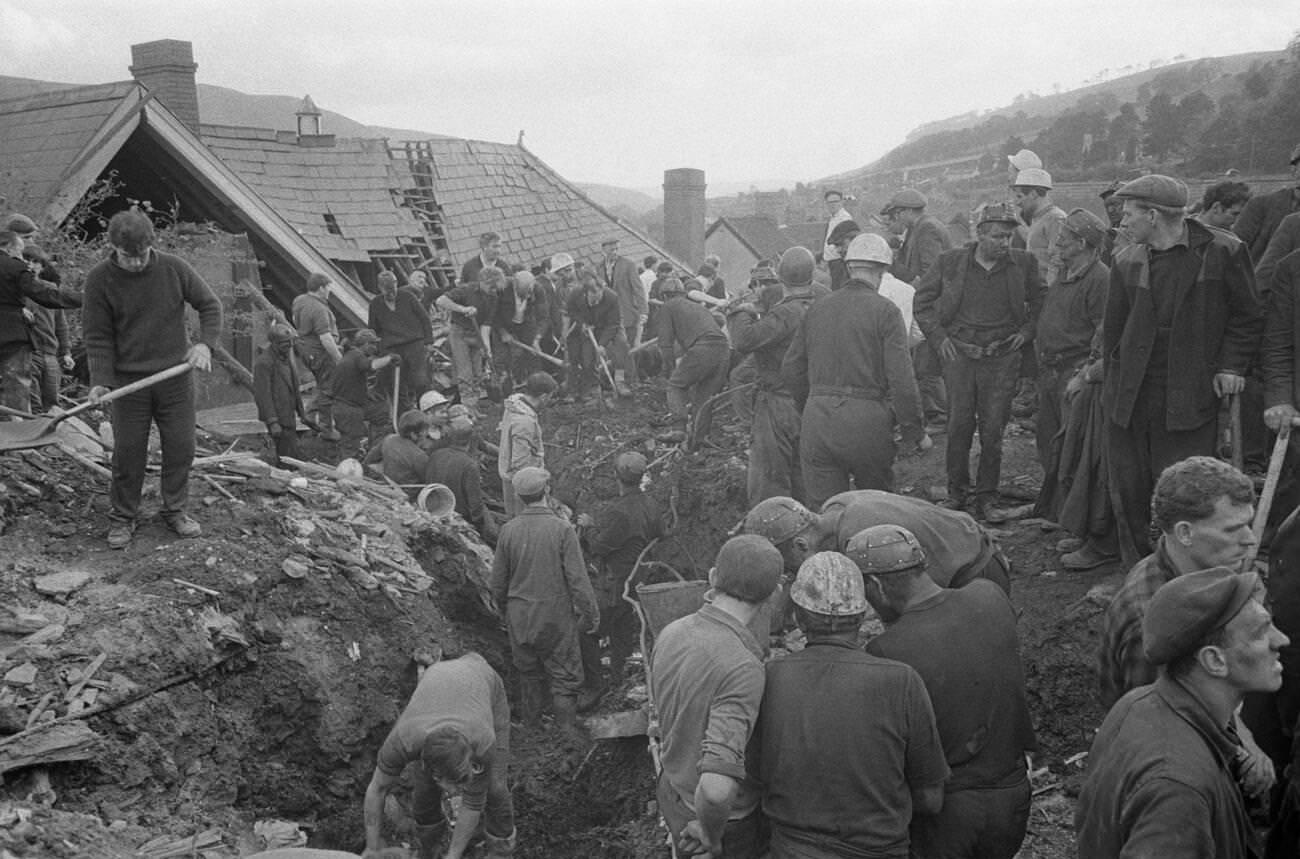 Mud and devastation caused by mining spoil from the hillside engulfing the Pantglas Junior School, 1966.