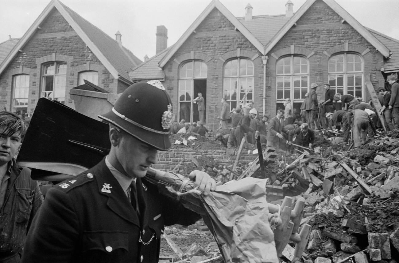 Mud and devastation caused by mining spoil from the hillside engulfing the Pantglas Junior School, 1966.