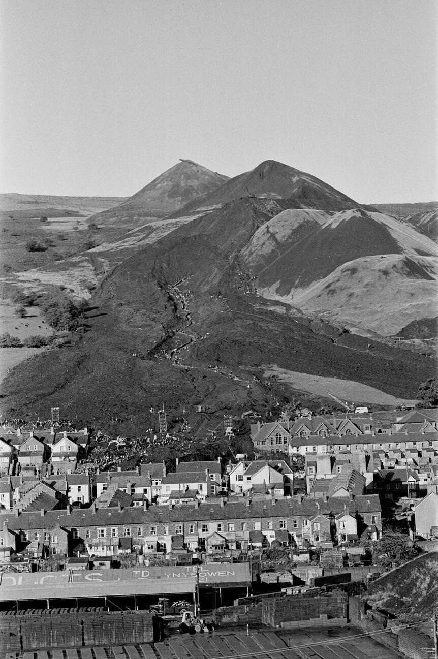 Mud and devastation caused by mining spoil from the hillside engulfing the Pantglas Junior School, 1966.