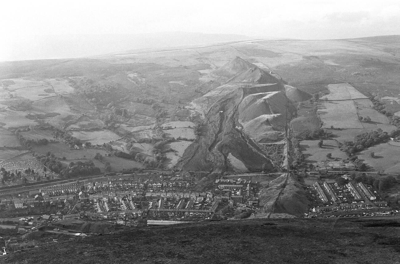 An aerial picture shows the town of Aberfan below, the hill and mud slide, and how the mud destroyed the school and houses in the town below, 1966.