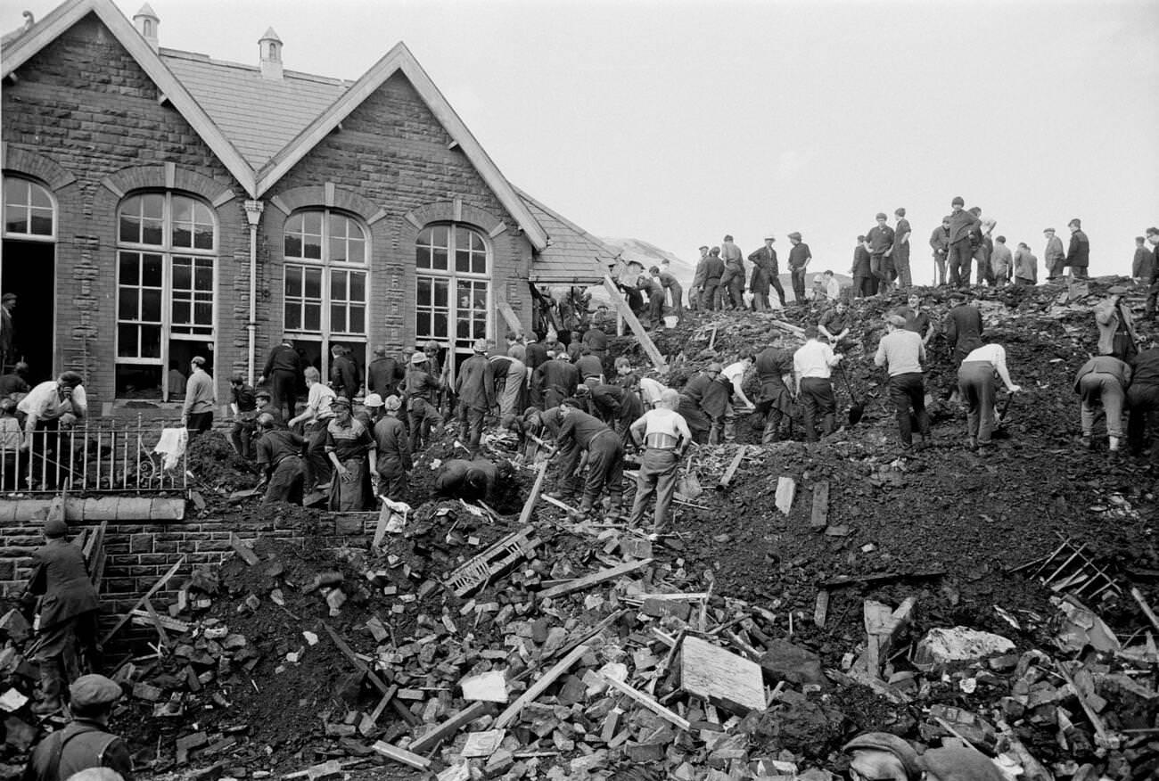 Mud and devastation caused by mining spoil from the hillside engulfing the Pantglas Junior School, 1966.