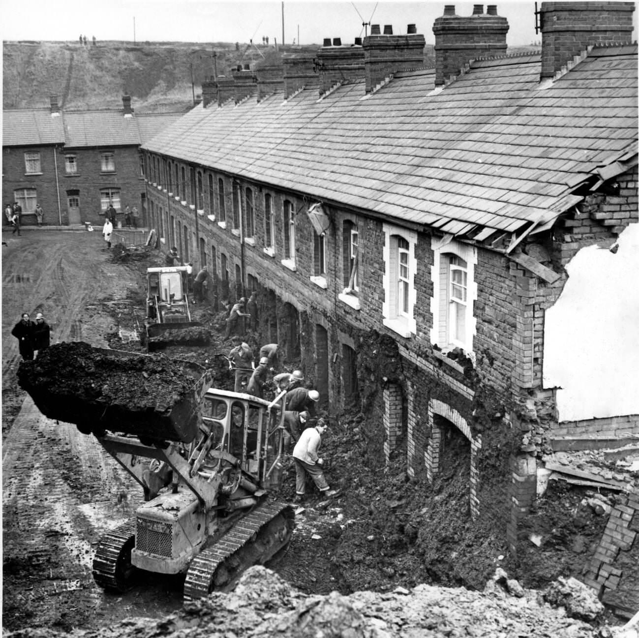 Mud and devastation caused by mining spoil from the hillside engulfing the Pantglas Junior School, 1966.