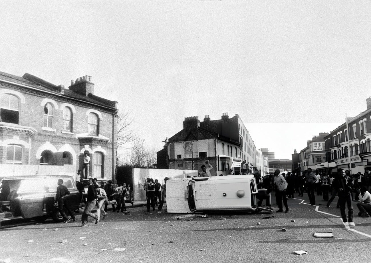 Violence erupts and vehicles are turned over at Brixton, South London, 1981.