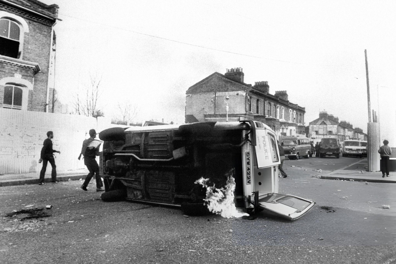 Flames coming from an overturned police van in Brixton, South London. Youths attacked Police Officers and their vehicles, 1981.