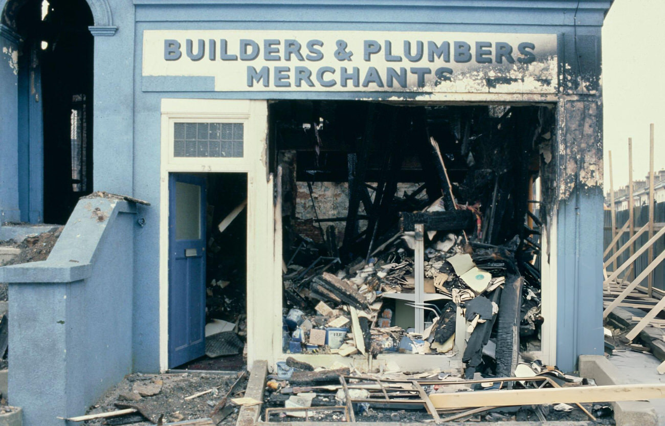 Debris in a burnt-out plumber shop after the first Brixton Riot, London, 1981.