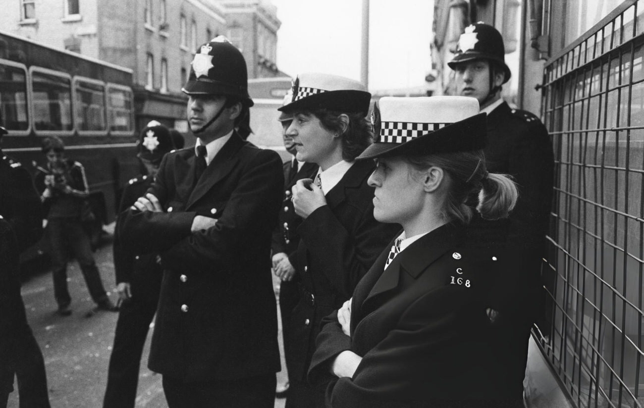 Riots in a predominantly Afro-Caribbean neighborhood in Brixton, London, 1981.