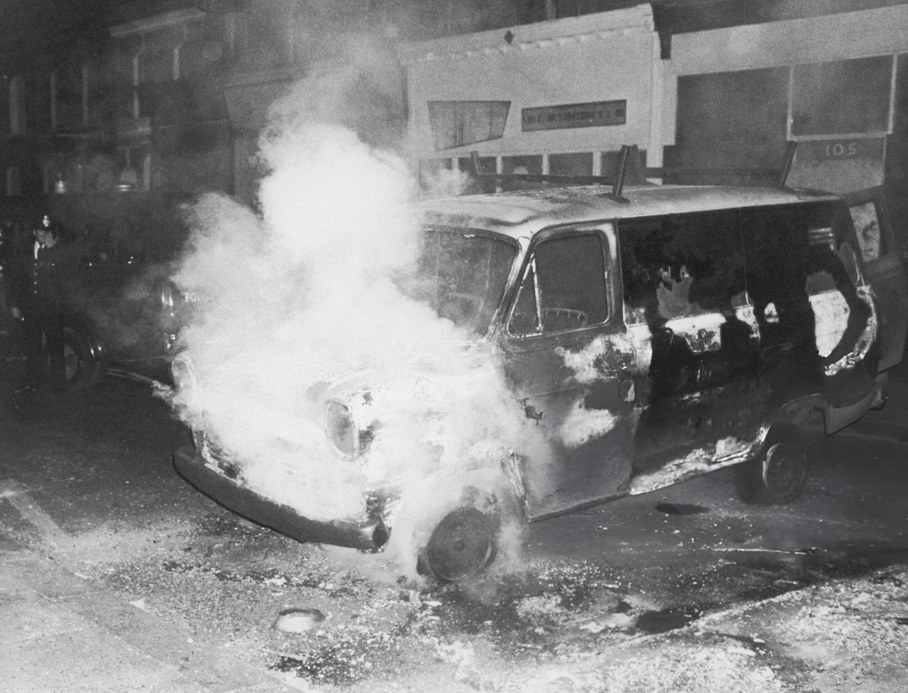 A van burning during a night of rioting in Brixton, London, 1981.