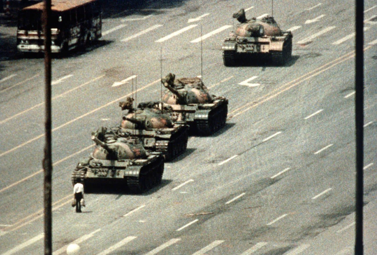 A demonstrator blocks the path of a tank convoy along the Avenue of Eternal Peace near Tiananmen Square.