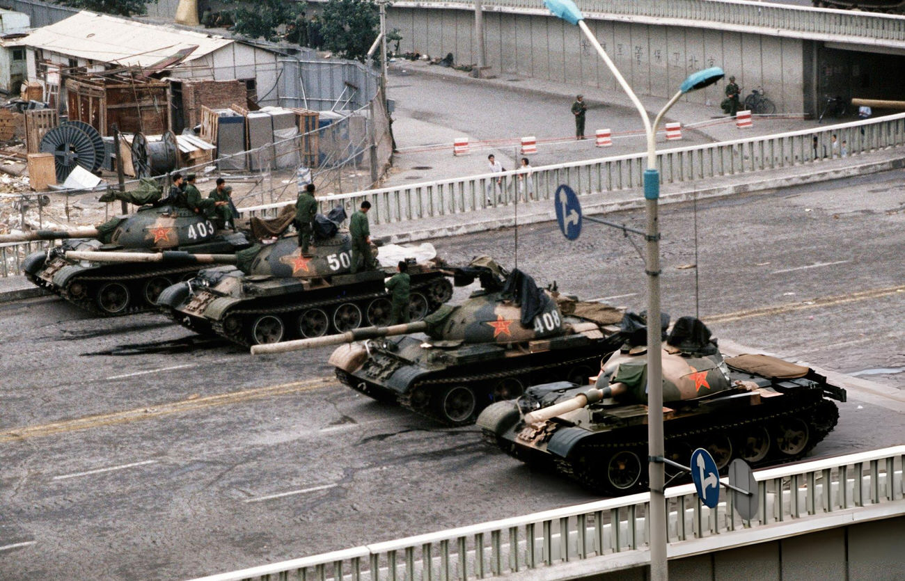 Chinese Army tanks block an overpass on Changan Avenue leading to Tiananmen Square, 1989.