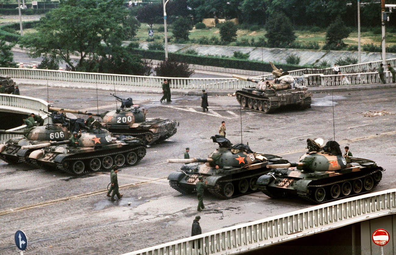 Chinese Army tanks block an overpass on Changan Avenue leading to Tiananmen Square, 1989.