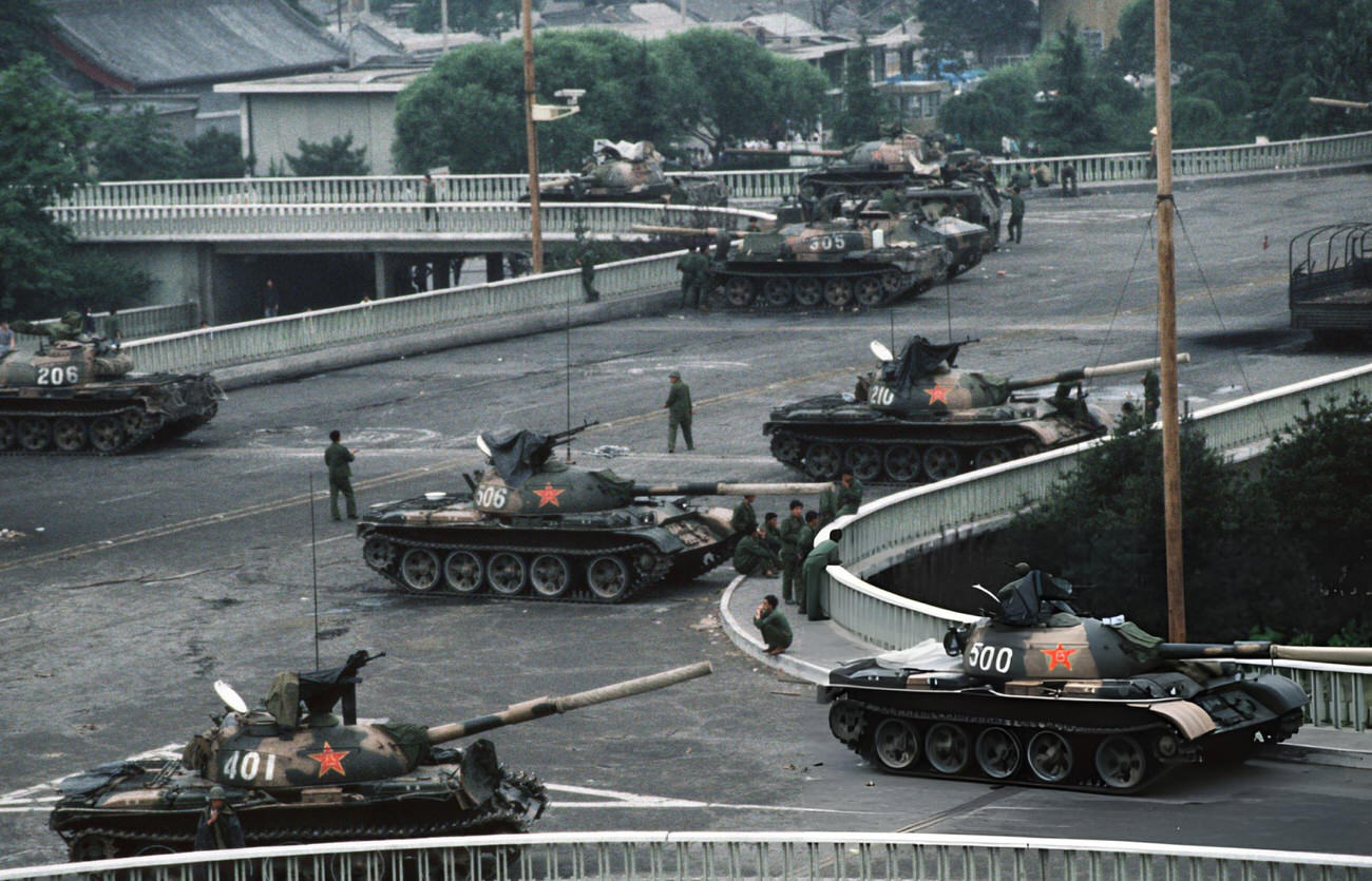 Chinese Army tanks block an overpass on Changan Avenue leading to Tiananmen Square, 1989.