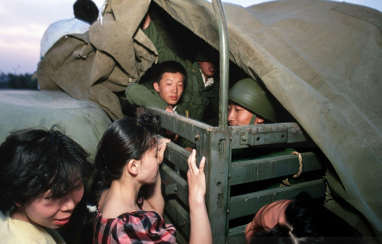 Soldiers talk with pro-democracy demonstrators, 1989.