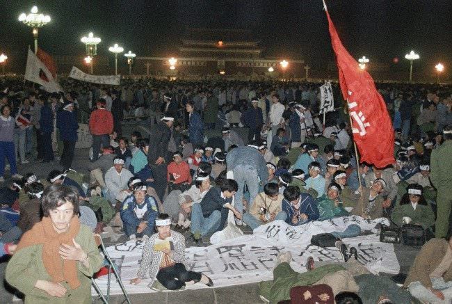 About 3,500 university students from more then a dozen school demand democracy and freedom keep on hunger strike at night, Saturday, May 14, 1989 in Beijing at Tiananmen Square.