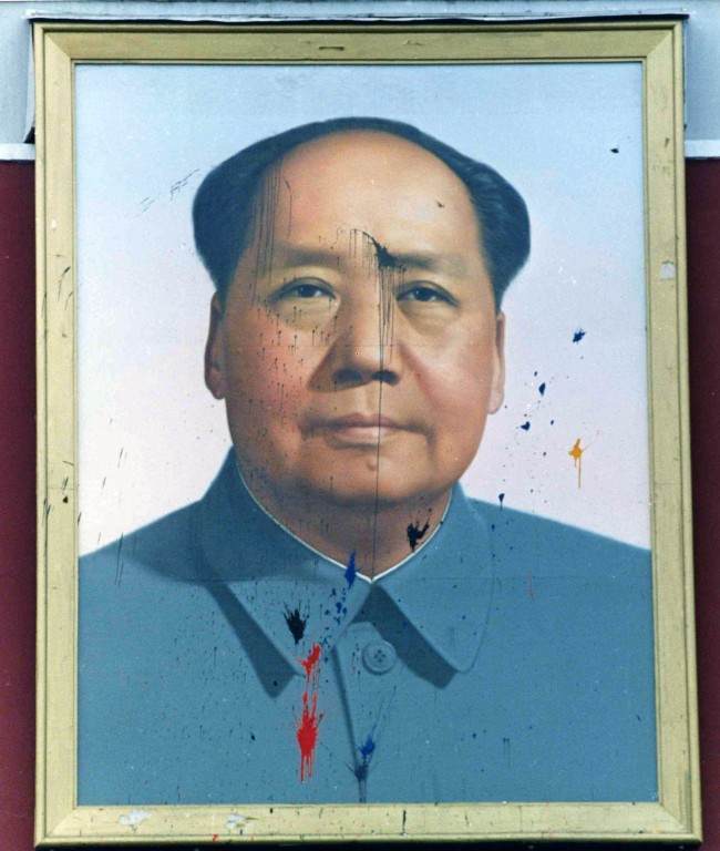 The famous portrait of Chairman Mao looking out over Tiananmen Square, Beijing, from the Forbidden City, May 23, 1989, was spattered with paint during the continuing demonstration in the square.