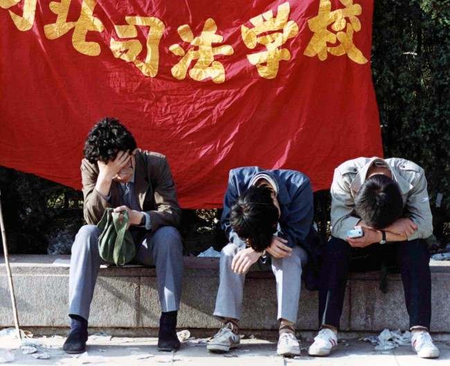 University students rest in Tainanmen Square, Beijing, on May 26, 1989, wher their strike for government reforms is in its 13th day.