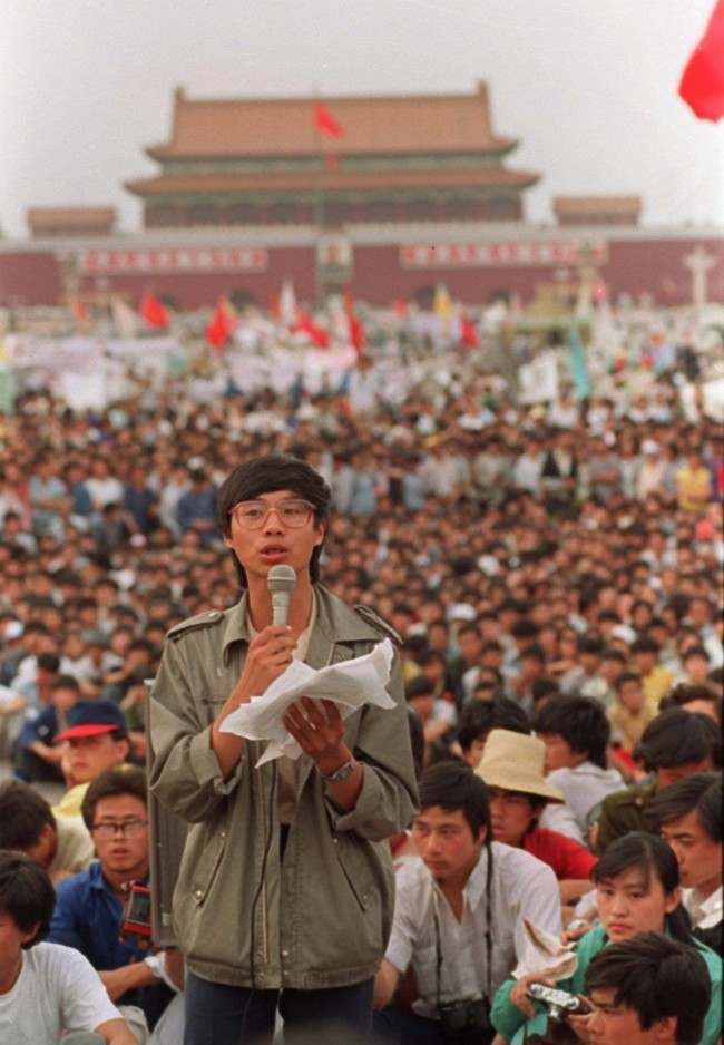 This is a May 27, 1989 photo of student leader Wang Dan in Tiananmen Square Beijing calling for a city wide march.