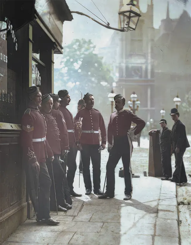 Members of the British Army stand outside a public house in Westminster, 1890s.