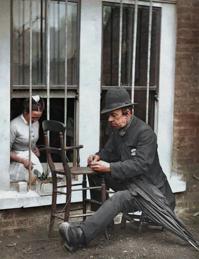 "Caney," a beloved clown, turned to mending chairs after a vein burst in his leg, 1890s.