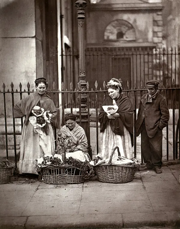 Poor women selling flowers at Covent Garden. Circa 1877.